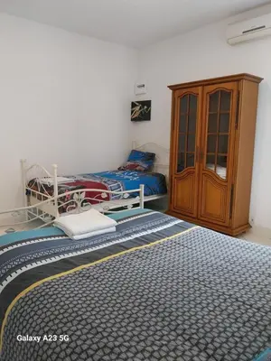 Un ou plusieurs lits dans un hébergement de l'établissement Cocon calme, 2 pièces Tours proche bord de Loire
