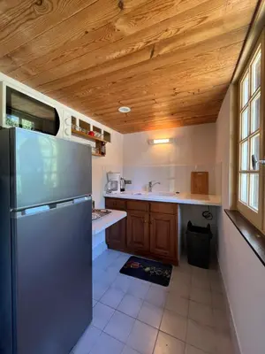 Cuisine ou kitchenette dans l'établissement Le petit Verdun