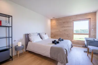 Un ou plusieurs lits dans un hébergement de l'établissement GreenWoods Ecolodge - Zoo de Beauval et Châteaux de la Loire