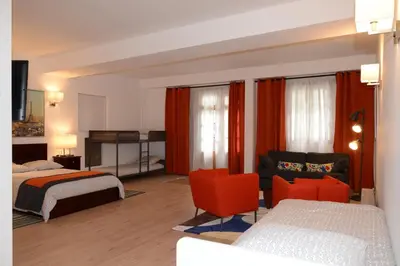 Un ou plusieurs lits dans un hébergement de l'établissement Les Chambres Panda