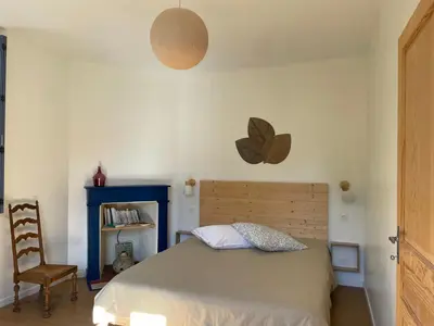 Un ou plusieurs lits dans un hébergement de l'établissement Chez Juliette - Maison et jardin - bord de Loire à Saumur