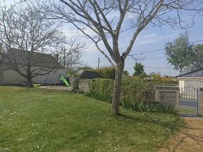 Jardin de l'établissement charmant studio dans une longère