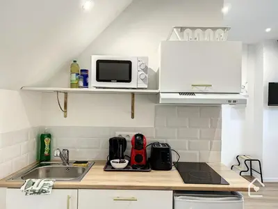 Cuisine ou kitchenette dans l'établissement Les studios d'Elina - Entrée autonome