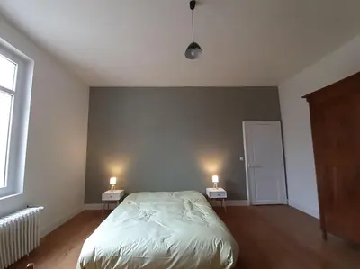 Un ou plusieurs lits dans un hébergement de l'établissement Très grande maison de ville au coeur de Saumur