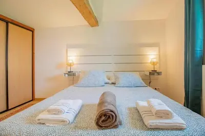 Un ou plusieurs lits dans un hébergement de l'établissement Manoir Les Touches - Gîtes