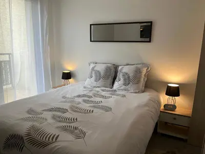 Un ou plusieurs lits dans un hébergement de l'établissement Calm in Tours - Appartement T2
