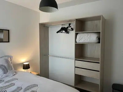 Un ou plusieurs lits dans un hébergement de l'établissement Calm in Tours - Appartement T2