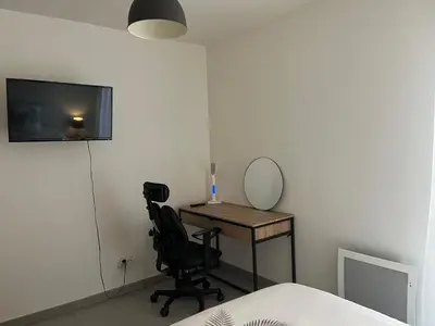 Télévision ou salle de divertissement dans l'établissement Calm in Tours - Appartement T2