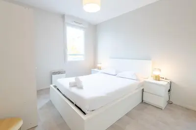 Un ou plusieurs lits dans un hébergement de l'établissement Pastel colors - Tours