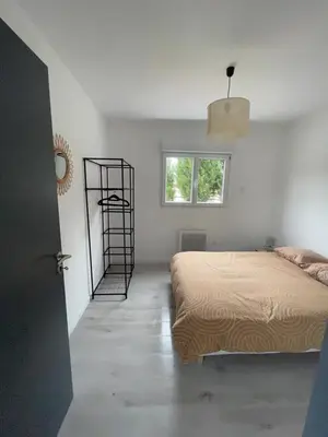 Un ou plusieurs lits dans un hébergement de l'établissement Les Chalets du Mancel - Chalet Sangria - 500 m Bouleries Jump , 10 min du circuit des 24h
