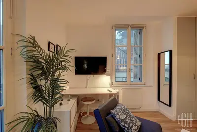 Télévision ou salle de divertissement dans l'établissement Le Fidji / 100m Gare