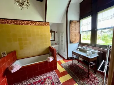 Un ou plusieurs lits dans un hébergement de l'établissement Château La Chevalerie - 24h du Mans