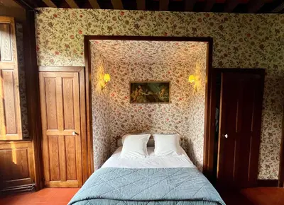 Un ou plusieurs lits dans un hébergement de l'établissement Château La Chevalerie - 24h du Mans