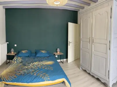 Un ou plusieurs lits dans un hébergement de l'établissement Maison spacieuse près du Mans et Tours, idéale pour famille, avec terrasse, jardin et parking - FR-1-410-425