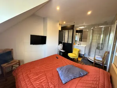 Un ou plusieurs lits dans un hébergement de l'établissement Chambre chez Alain et Armelle