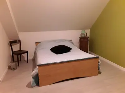 Un ou plusieurs lits dans un hébergement de l'établissement Chambre chez l'habitant virage de mulsanne
