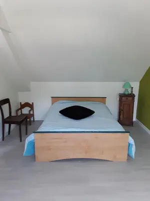 Un ou plusieurs lits dans un hébergement de l'établissement Chambre chez l'habitant virage de mulsanne