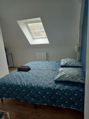 Un ou plusieurs lits dans un hébergement de l'établissement appart 2 chambres
