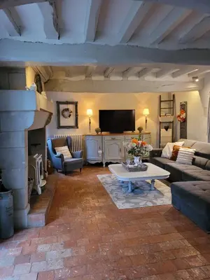 Télévision ou salle de divertissement dans l'établissement Gîte de charme, bord de Loire Ma Maison Angevine