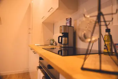 Cuisine ou kitchenette dans l'établissement Le Verlaine, T4 en triplex