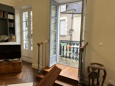 Télévision ou salle de divertissement dans l'établissement Le Saint Nicolas~Hyper centre