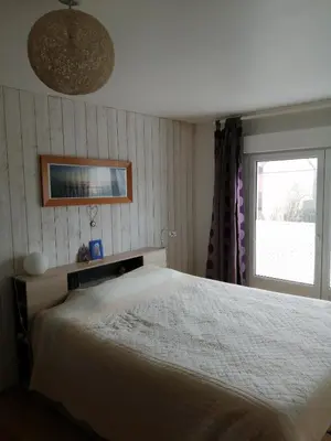 Un ou plusieurs lits dans un hébergement de l'établissement Chambre des perdrix