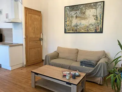 Coin salon dans l'établissement Appartement proche centre/gare