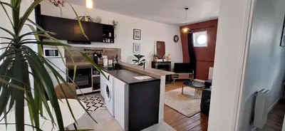 Cuisine ou kitchenette dans l'établissement Le petit Rochambeau