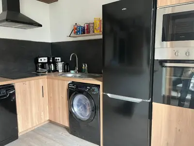 Cuisine ou kitchenette dans l'établissement Côté Médicis - Cosy appartement au coeur de Blois