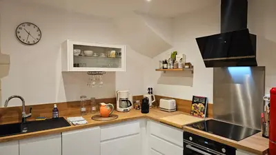 Cuisine ou kitchenette dans l'établissement Duplex élégant Tours quais de Loire
