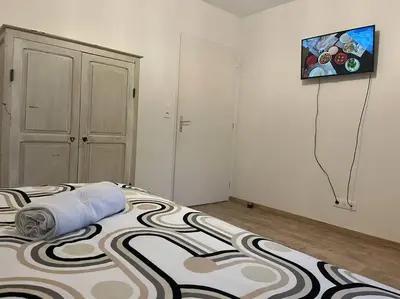 Un ou plusieurs lits dans un hébergement de l'établissement La Villa Coquette