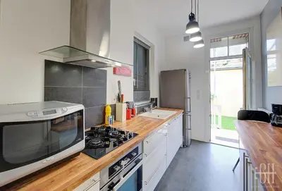 Cuisine ou kitchenette dans l'établissement Loéva - Maison de famille
