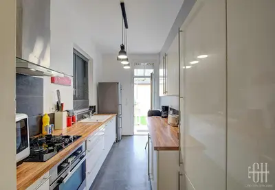 Cuisine ou kitchenette dans l'établissement Loéva - Maison de famille