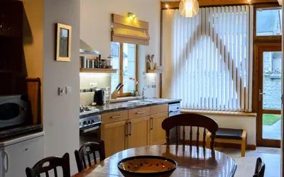Cuisine ou kitchenette dans l'établissement Gites Arches de Muschamp