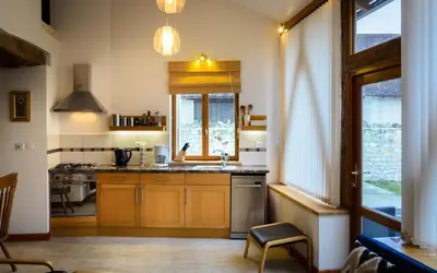 Cuisine ou kitchenette dans l'établissement Gites Arches de Muschamp