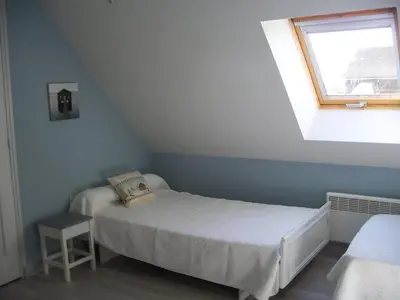 Un ou plusieurs lits dans un hébergement de l'établissement Gîte La Fortaiserie