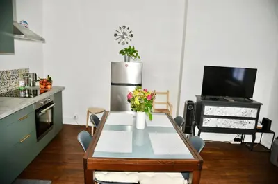 Cuisine ou kitchenette dans l'établissement *Cocooning Family*