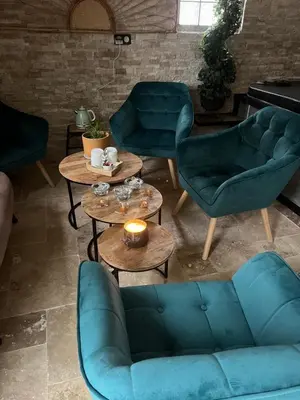 Coin salon dans l'établissement L’Éden