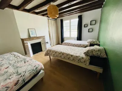 Un ou plusieurs lits dans un hébergement de l'établissement La Maison de Marion