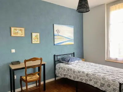 Un ou plusieurs lits dans un hébergement de l'établissement Le Clos Aime