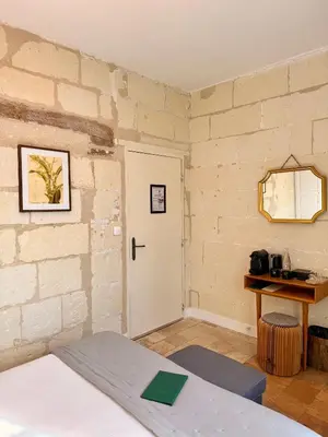 Un ou plusieurs lits dans un hébergement de l'établissement Le Presbytère • Maison Flore