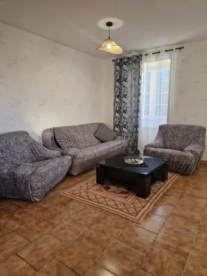 Coin salon dans l'établissement Belle maison a Brizay