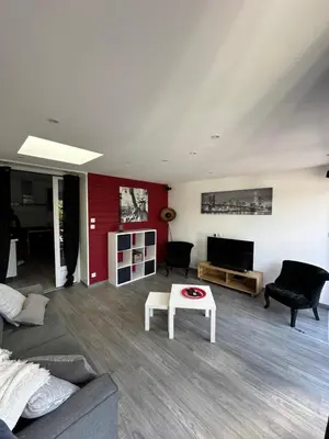Coin salon dans l'établissement La Victoria - Charmante maison en centre ville - Gare - Jardin