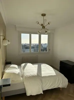 Un ou plusieurs lits dans un hébergement de l'établissement Appartement de charme hyper centre Le Mans