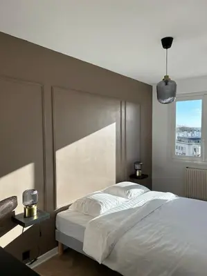 Un ou plusieurs lits dans un hébergement de l'établissement Appartement de charme hyper centre Le Mans