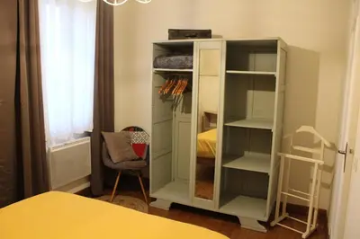 Un ou plusieurs lits dans un hébergement de l'établissement Charmante maison à la campagne