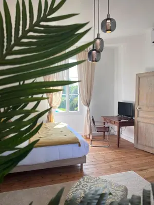 Un ou plusieurs lits dans un hébergement de l'établissement Le Clos Gabrielle