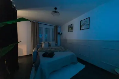 Un ou plusieurs lits dans un hébergement de l'établissement CineHome - 5 min Tours centre-Parking/Tram au pied