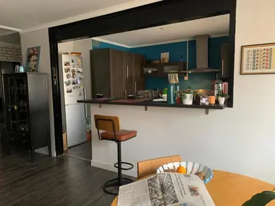 Cuisine ou kitchenette dans l'établissement Nature et confort appart