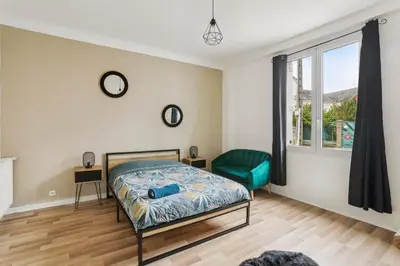 Un ou plusieurs lits dans un hébergement de l'établissement Appartement Neuf Proche Circuit 24h